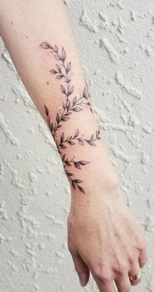 forearm vine tattoo|elegant vine tattoos for women.